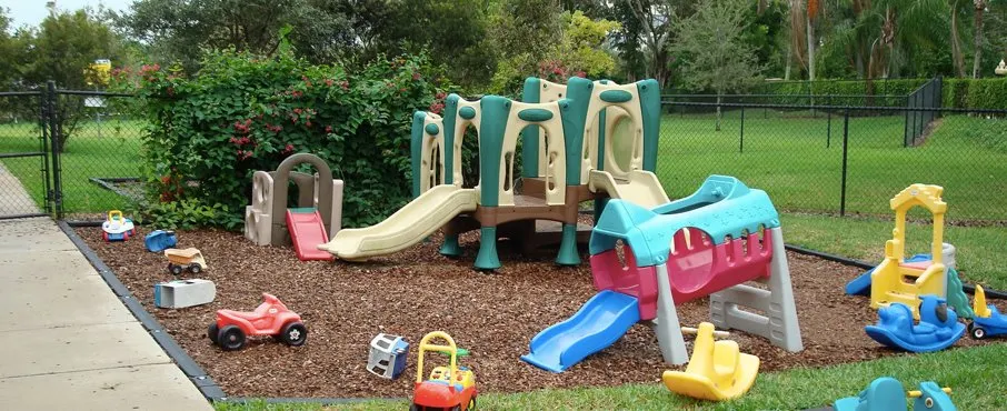 A playground climbing structure and slide